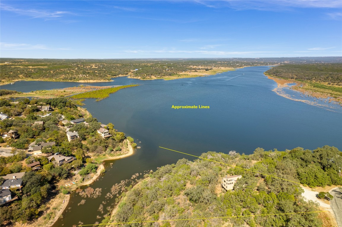 501 Coventry Road Spicewood, TX 78669 - Photo 2 of 24 a view of an ocean and beach