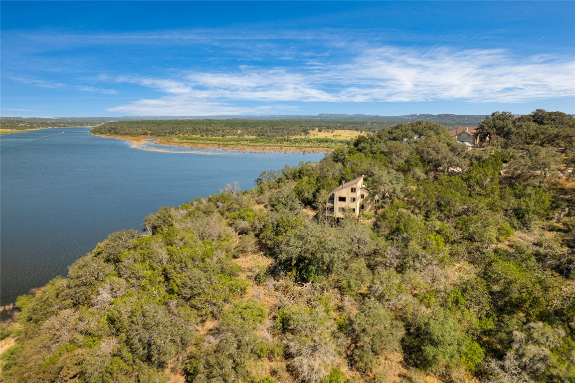 501 Coventry Road Spicewood, TX 78669 - Photo 23 of 24 a view of an ocean and beach
