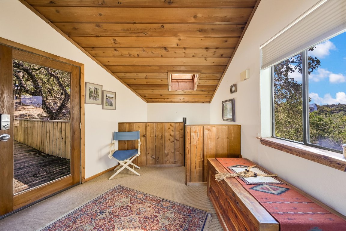 501 Coventry Road Spicewood, TX 78669 - Photo 10 of 24 a room with furniture and window