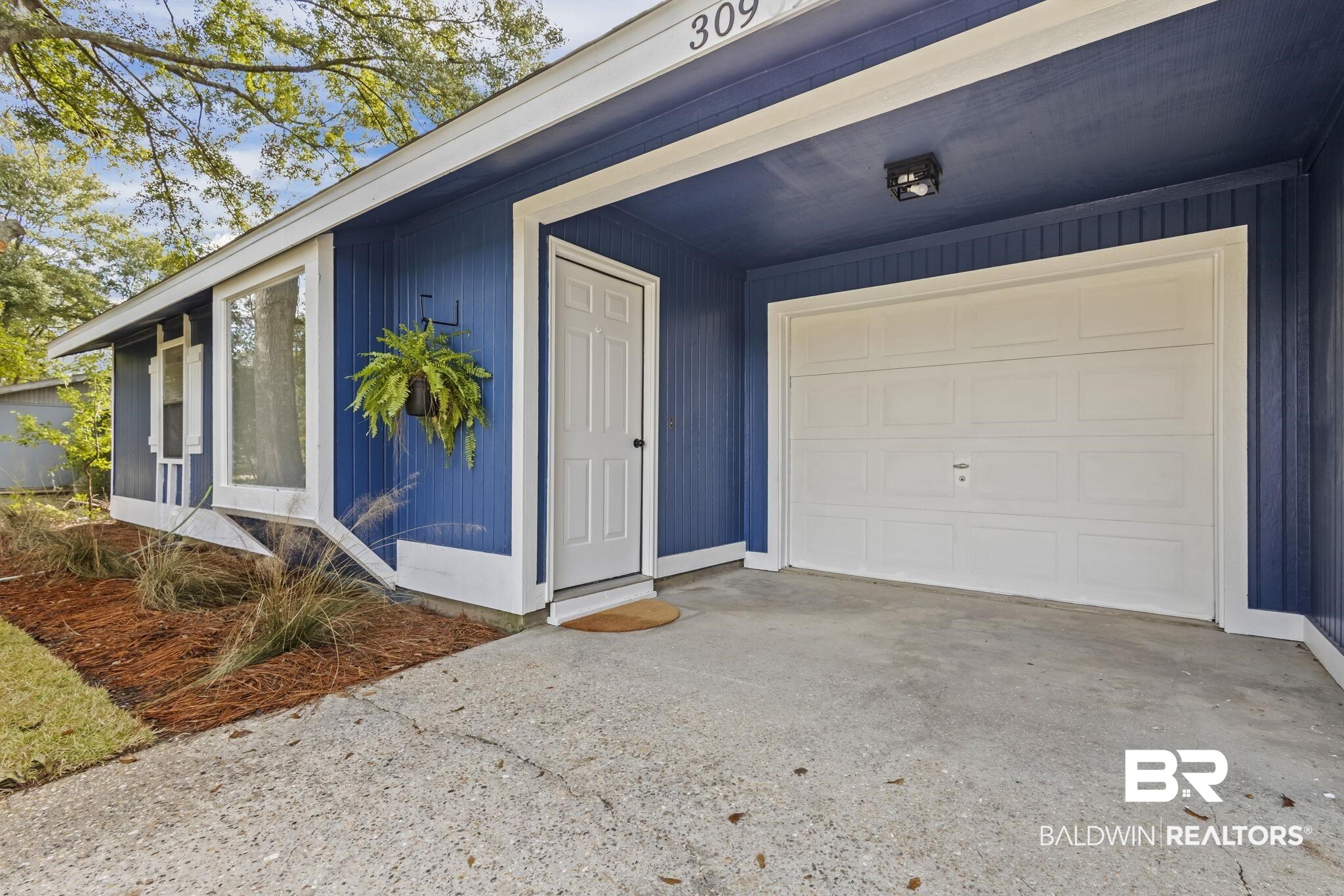 309 West Roosevelt Avenue Foley, AL 36535 - Photo 21 of 60 View of garage