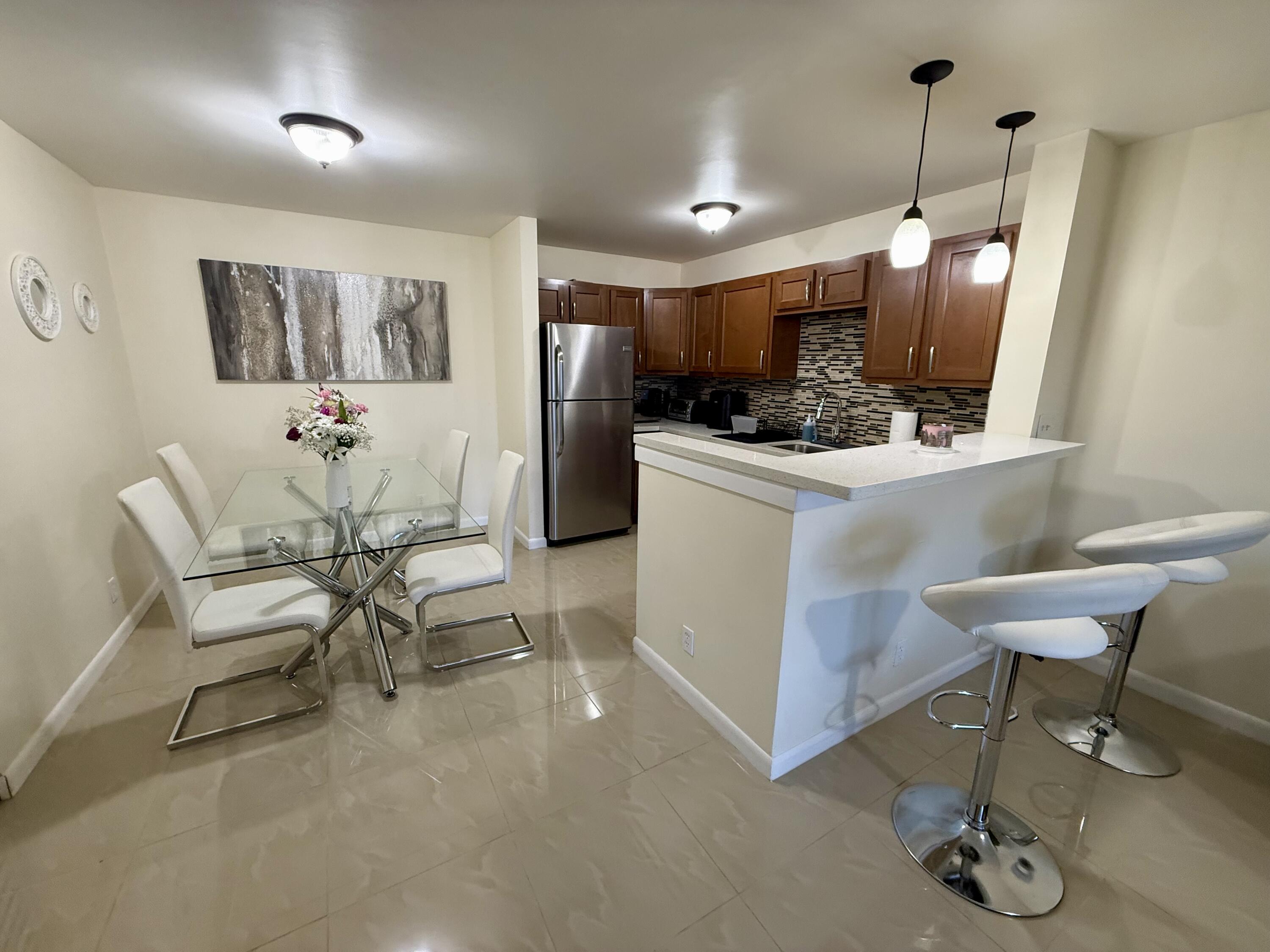 3280 Northwest 104th Avenue, Unit 3280 Coral Springs, FL 33065 - Photo 2 of 11 Dining Room/Kitchen