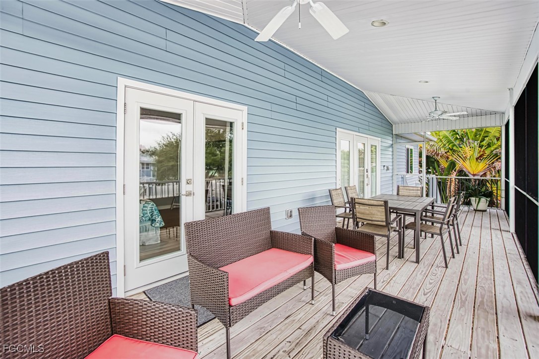 431 Lazy Way Fort Myers Beach, FL 33931 - Photo 12 of 40 a building outdoor space with patio furniture