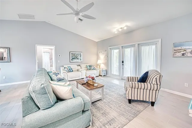 a living room with furniture and a couch