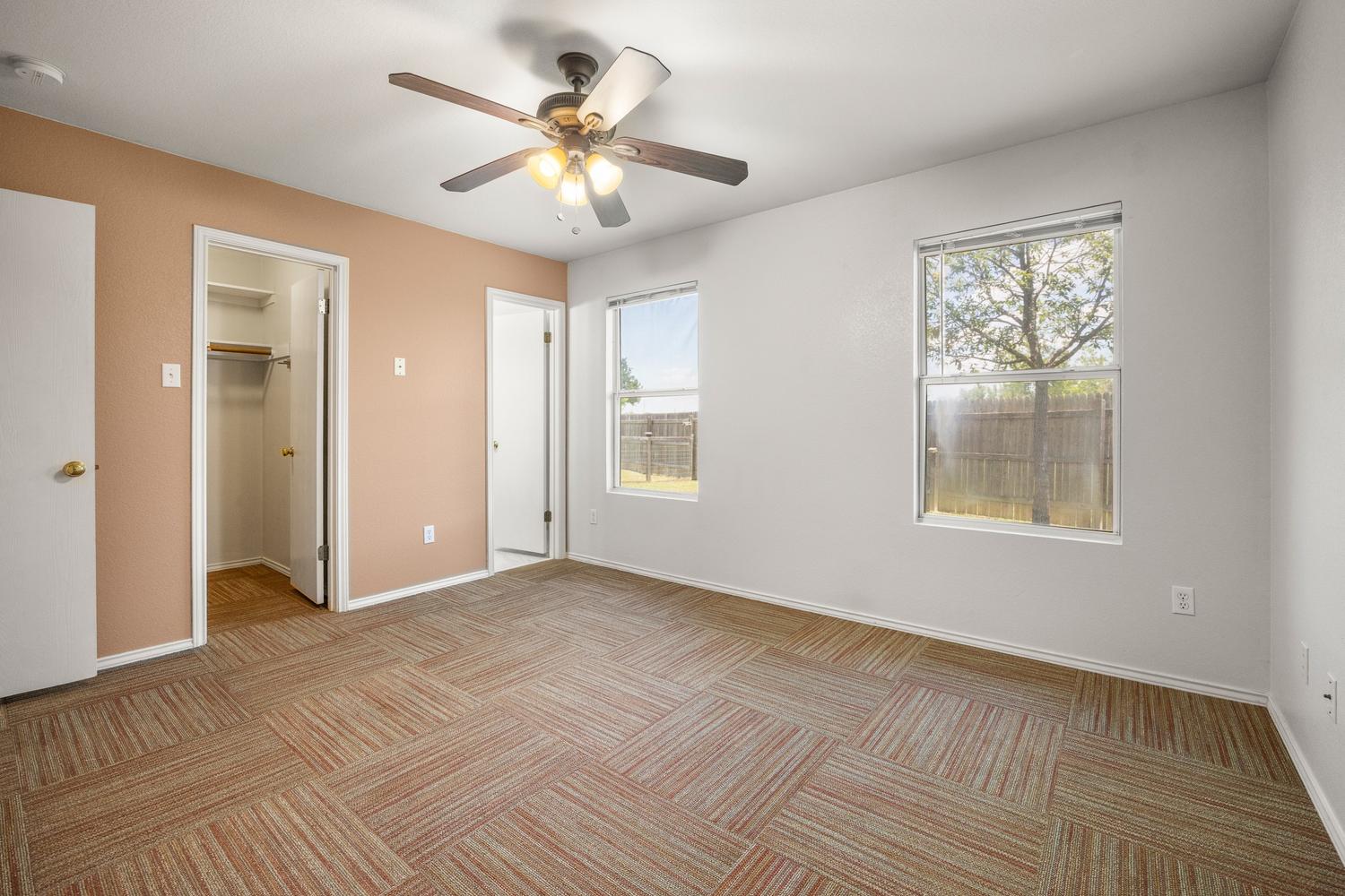 359 Spring Branch Loop Kyle, TX 78640 - Photo 9 of 17 a view of an empty room with a window
