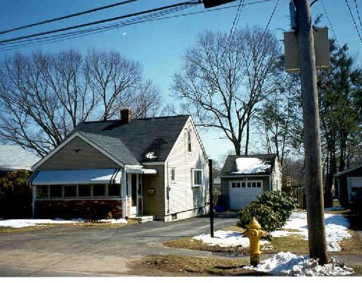 371 Welchs Point Road Milford, CT 06460 - Photo 1 of 1 a front view of a house with garden