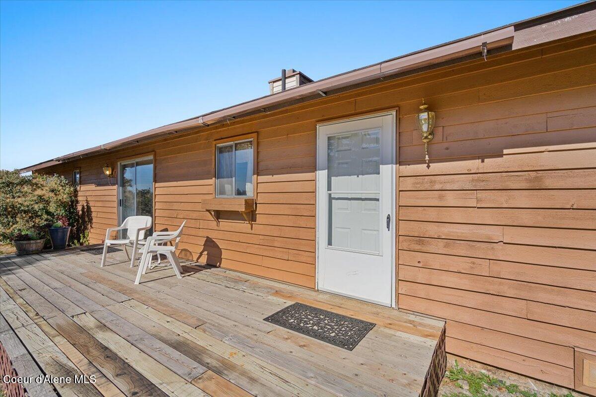 15200 North Rimrock Road Hayden, ID 83835 - Photo 10 of 45 10-Front deck and entry