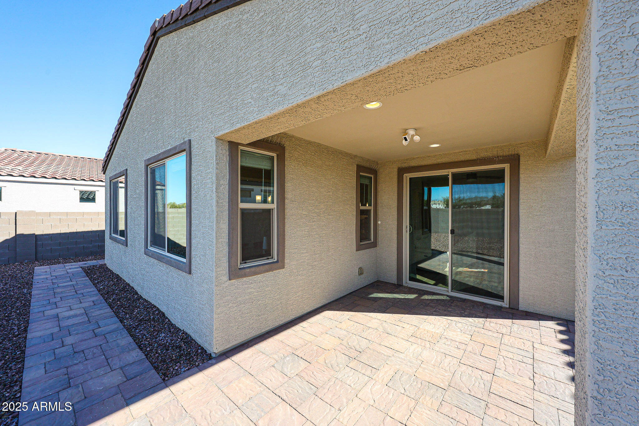 18062 West Amber Ridge Way Goodyear, AZ 85338 - Photo 38 of 68 Paver Patio and Walkway Around Home