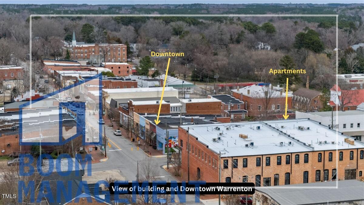 202 South Main Street, Unit 1BR 1 Bath, NC 27808 - Photo 1 of 31 a view of a balcony with chairs