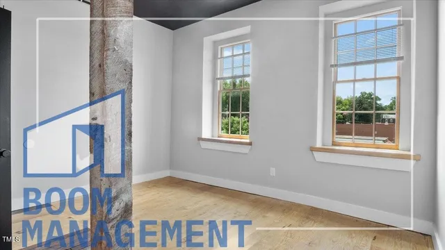 a view of an empty room with a window