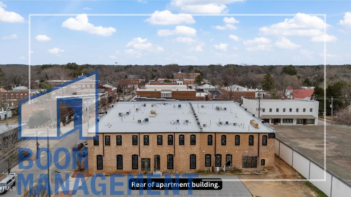 202 South Main Street, Unit 1BR 1 Bath, NC 27808 - Photo 3 of 31 a view of balcony with a lot of buildings
