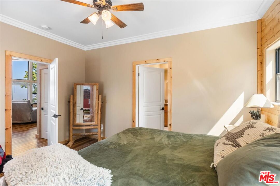 28081 Deertrail Drive Tehachapi, CA 93561 - Photo 14 of 31 a bedroom with a bed and a walk in closet