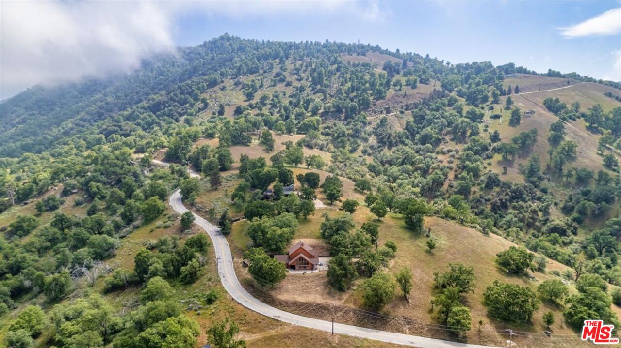 28081 Deertrail Drive Tehachapi, CA 93561 - Photo 29 of 31 an aerial view of residential house with outdoor space and trees all around