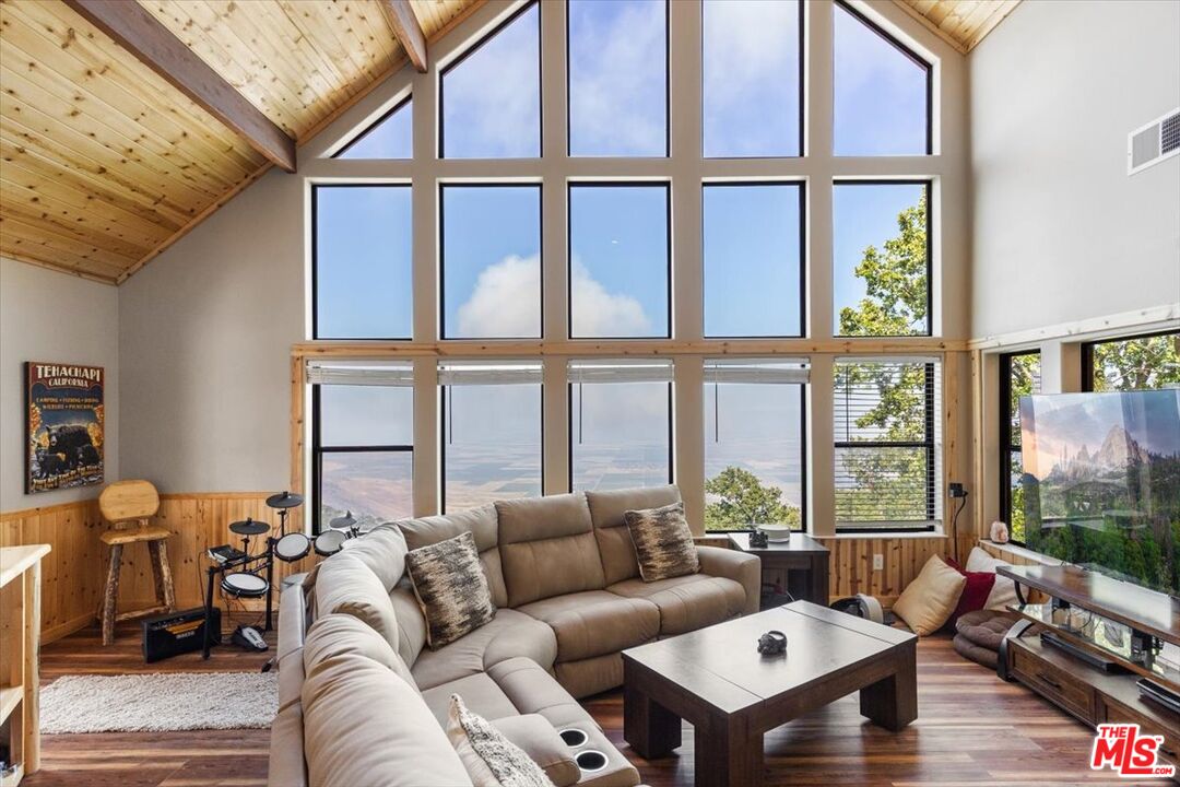 28081 Deertrail Drive Tehachapi, CA 93561 - Photo 7 of 31 a living room with furniture and a large window