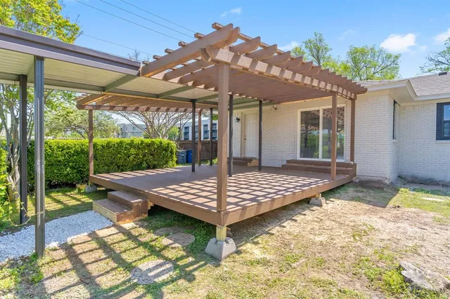 a outdoor space with swimming pool table and chairs