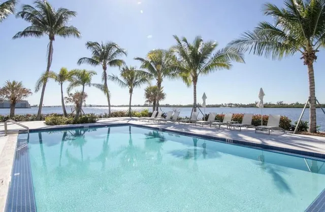 a view of a swimming pool and a chair