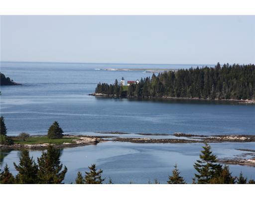 232 Minturn Road Swans Island, ME 04685 - Photo 12 of 25 View. view of the lighthouse and...