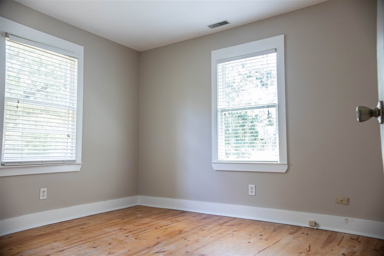 8916 Deadfall Road Millington, TN 38053 - Photo 6 of 13 Both bedrooms have lovely hardwood floors. Big double closets in both Bedrooms.