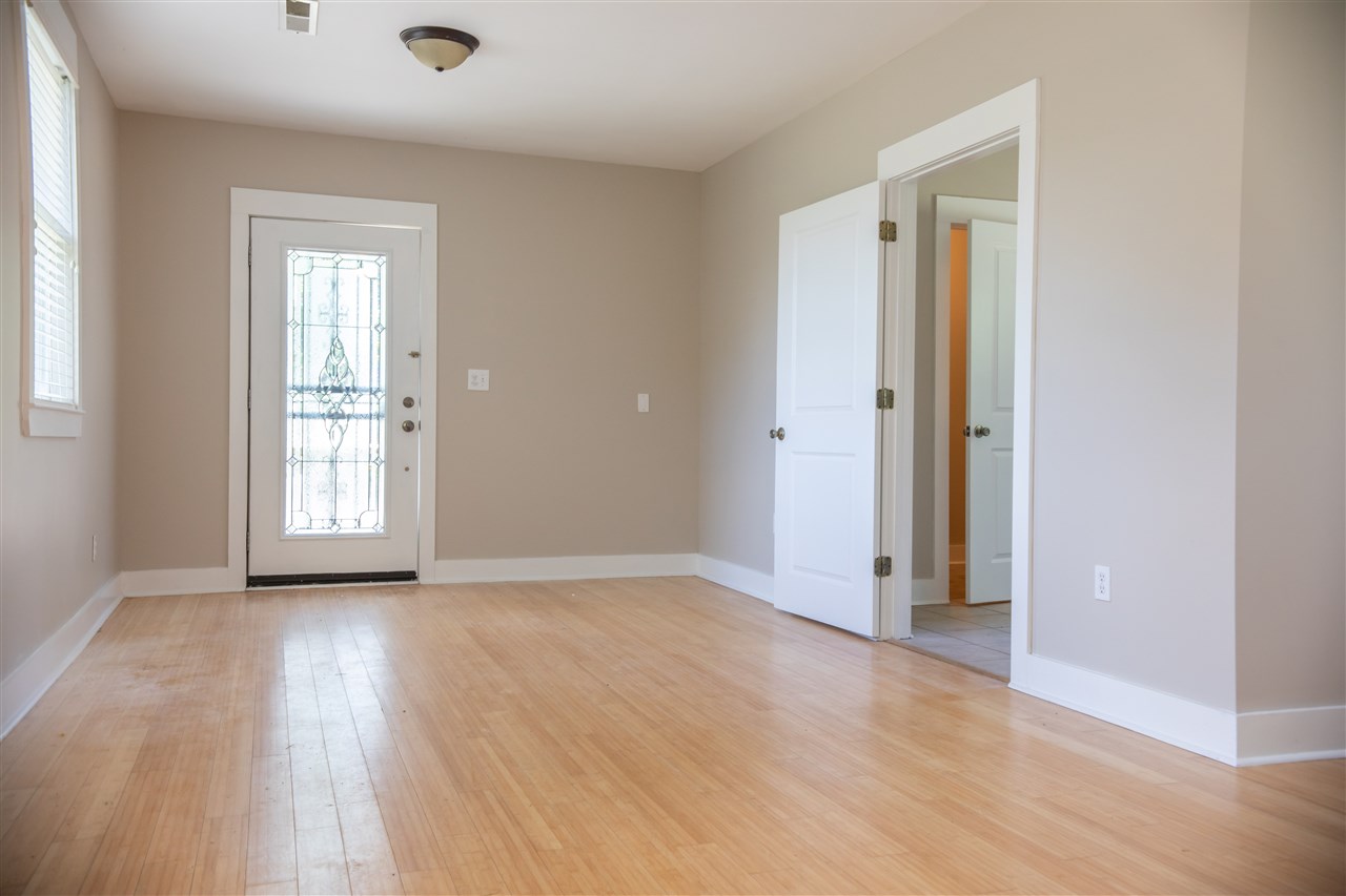 8916 Deadfall Road Millington, TN 38053 - Photo 9 of 13 Take a right to nice size Laundry/Mud Room. Large, Tiled Closet for small office ? off Laundry. Tankless Hot Water in Laundry. She did it right.