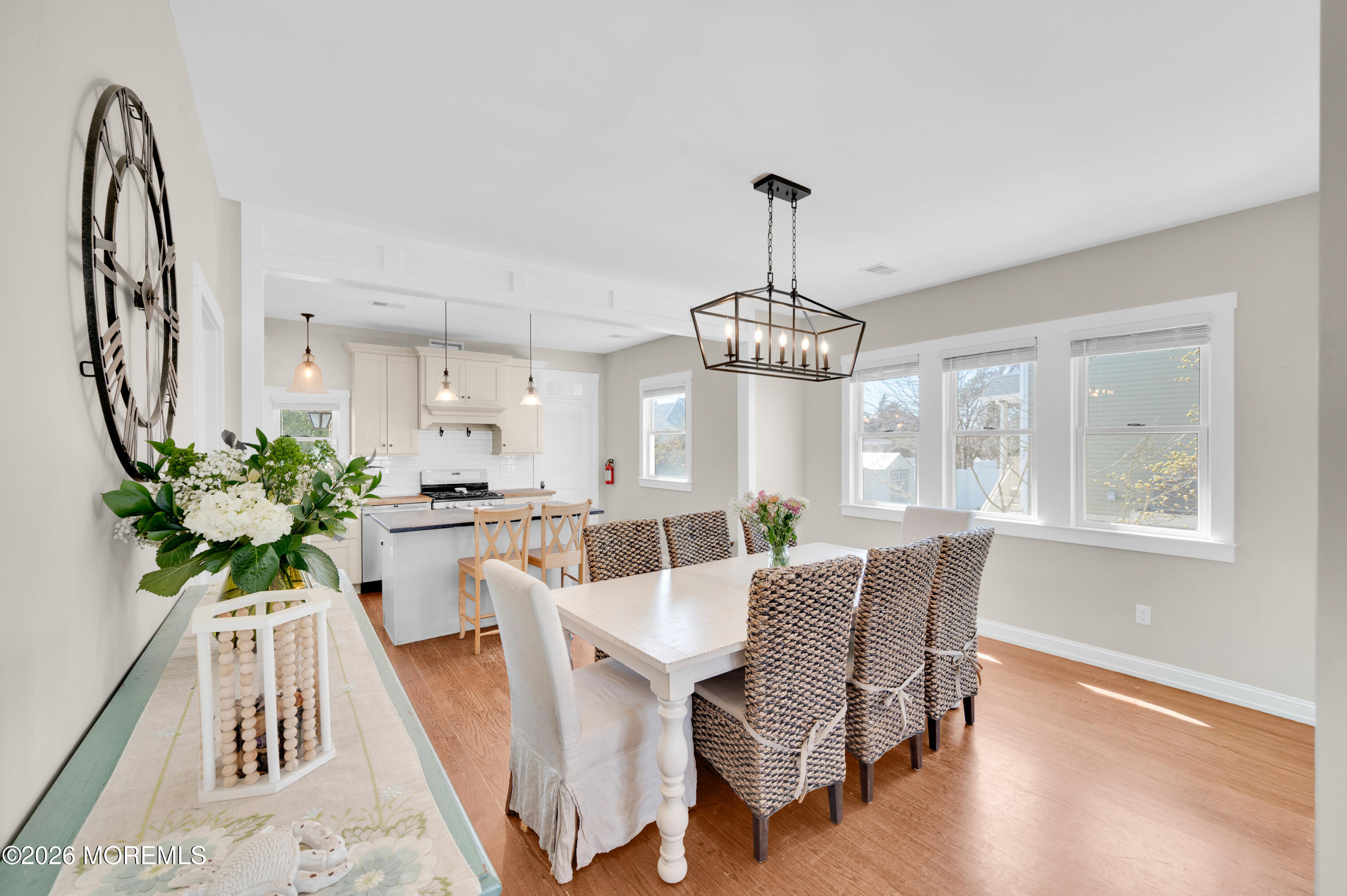 203 Riviera Drive Toms River, NJ 08753 - Photo 12 of 37 a view of a dining room with furniture wooden floor and chandelier