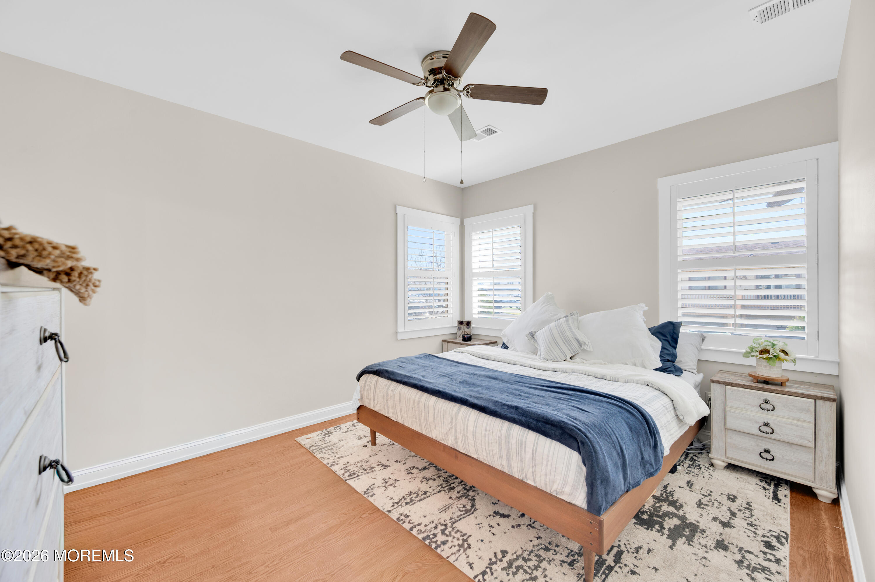 203 Riviera Drive Toms River, NJ 08753 - Photo 19 of 37 a bedroom with a bed and a window
