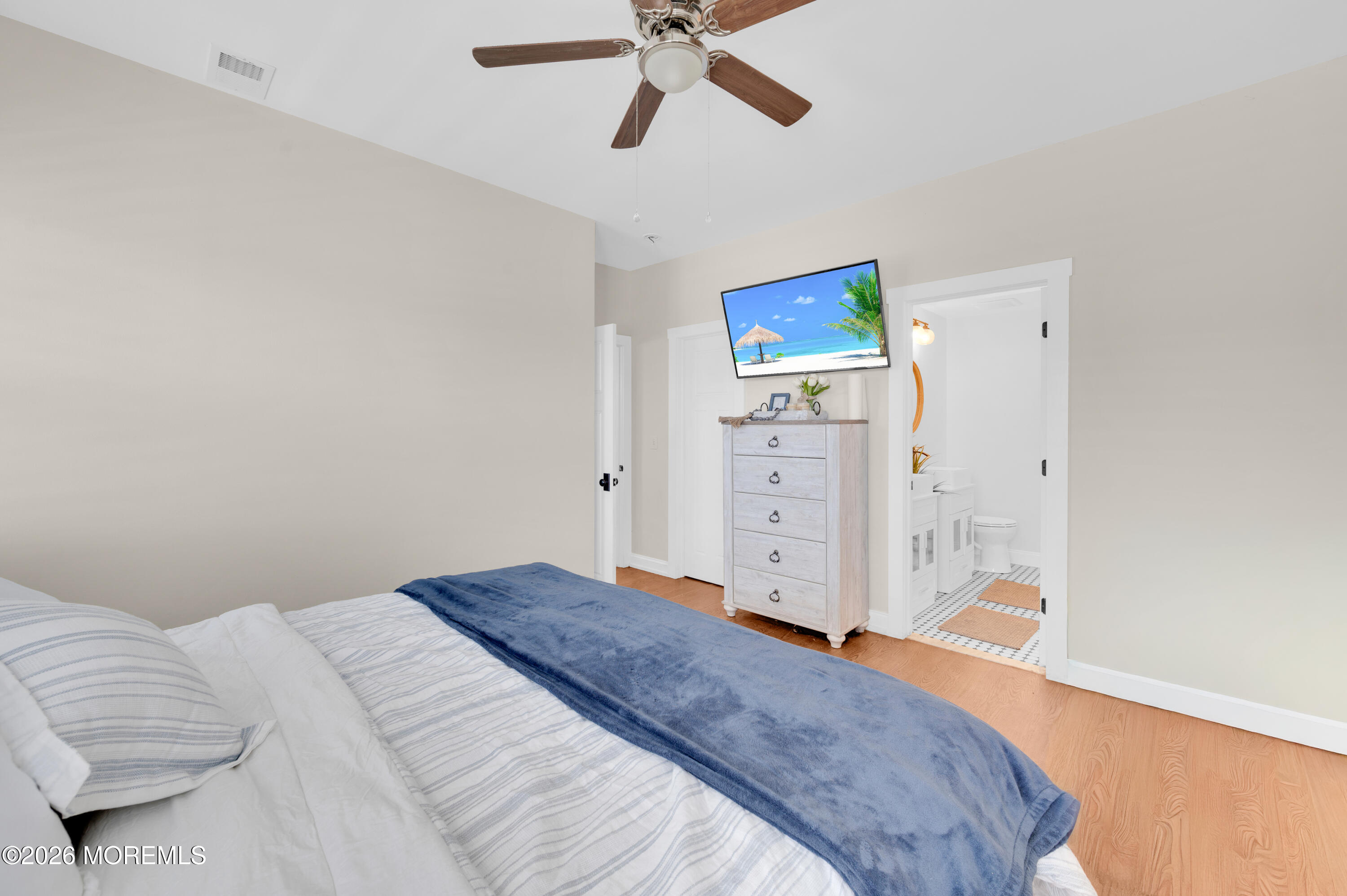 203 Riviera Drive Toms River, NJ 08753 - Photo 20 of 37 a bedroom with a bed and a window