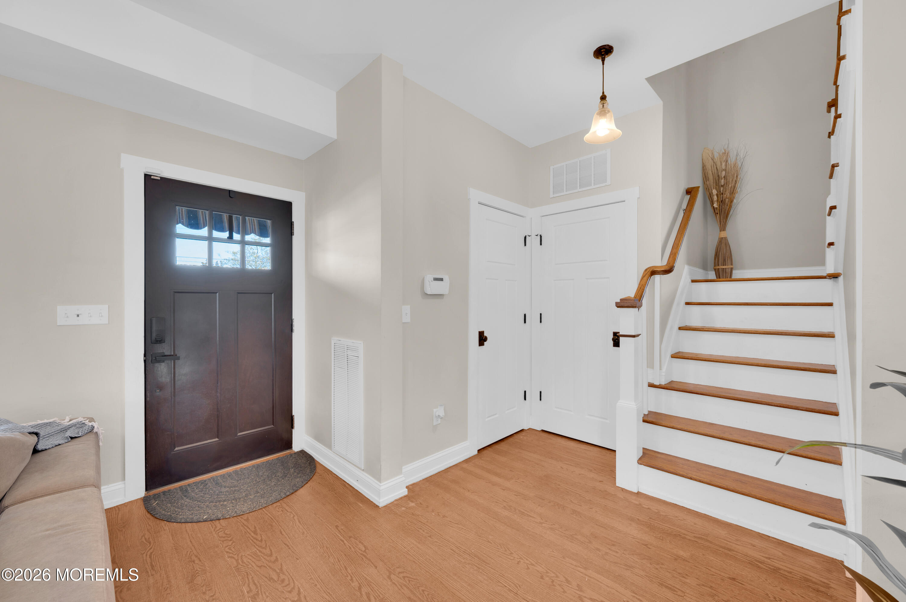 203 Riviera Drive Toms River, NJ 08753 - Photo 4 of 37 a view of entryway with wooden floor