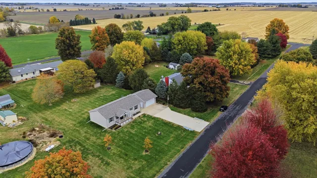 a view of a yard with an ocean view