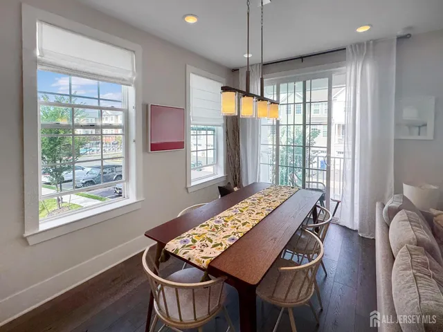 a dining room with wooden floor