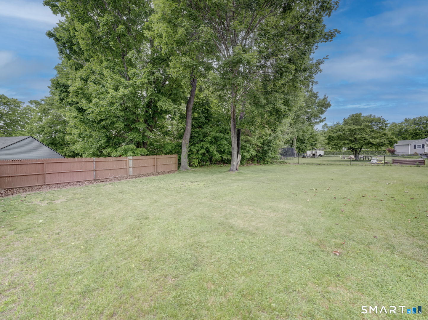 53 Goodwin Drive Somers, CT 06071 - Photo 18 of 22 a view of outdoor space with deck and yard