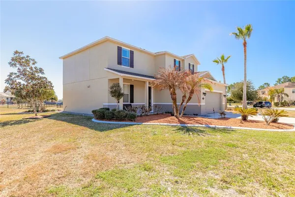 a view of a house with swimming pool