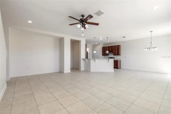 a view of a kitchen with a sink dishwasher and a microwave