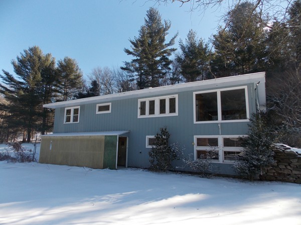 197 Littleton Road Harvard, MA 01451 - Photo 2 of 9 a front view of a house with a garden