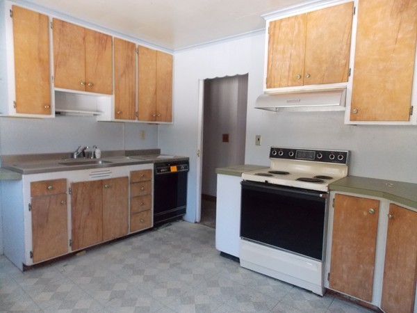 197 Littleton Road Harvard, MA 01451 - Photo 6 of 9 a kitchen with stainless steel appliances granite countertop a stove a refrigerator and a sink