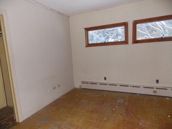 197 Littleton Road Harvard, MA 01451 - Photo 7 of 9 a view of a room with rack on the wall and a window