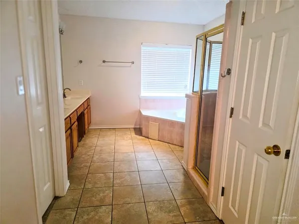 a view of a hallway with hallway and stairs