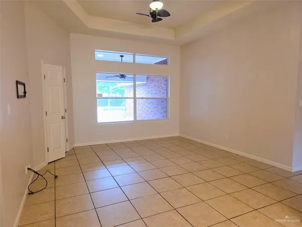 a view of an empty room and window