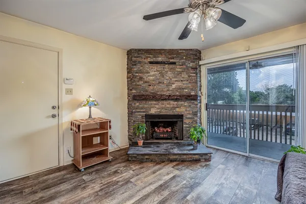 a small room with table and a chair