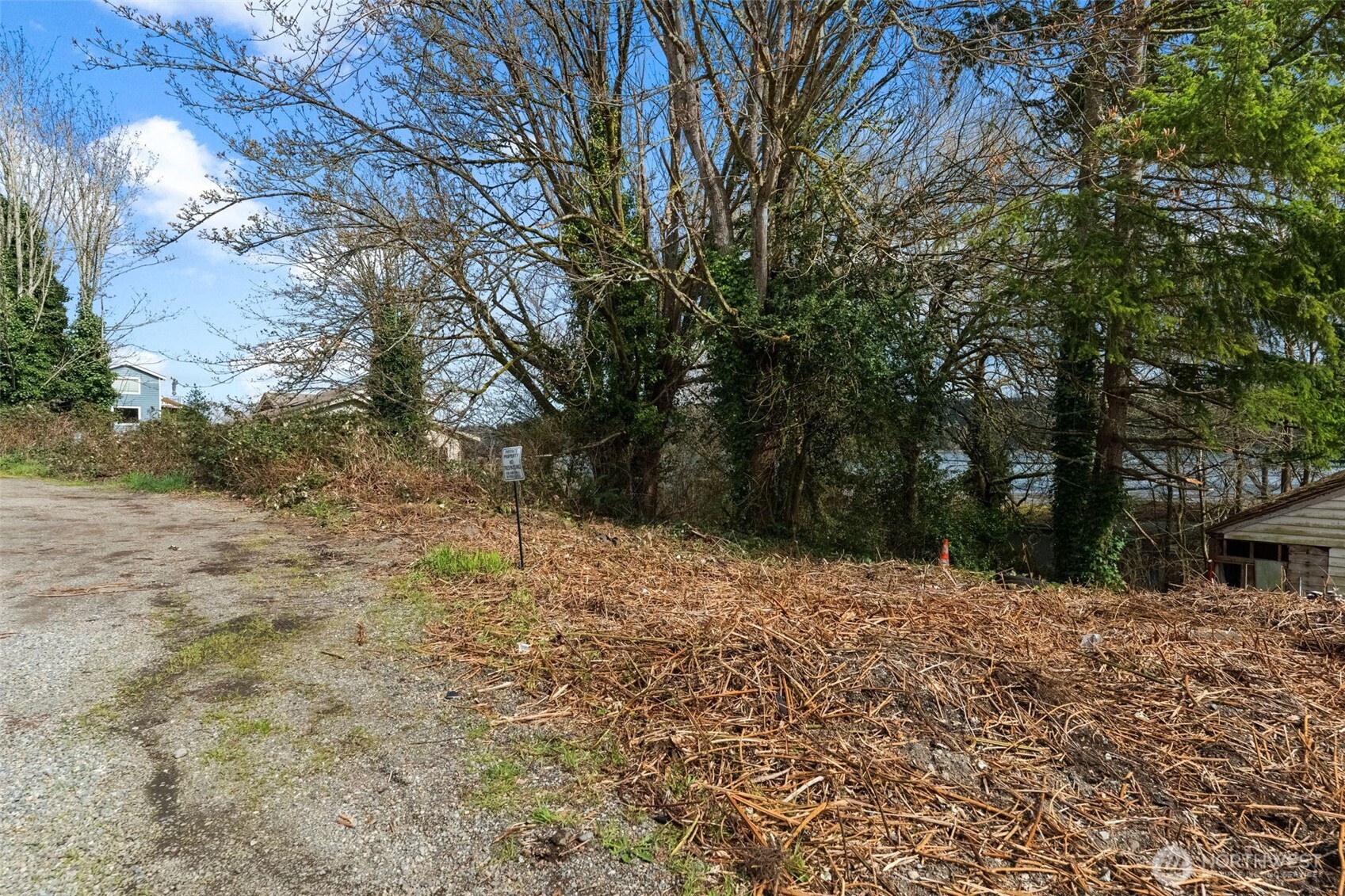 5280 Illahee Road Northeast Bremerton, WA 98311 - Photo 7 of 30 a backyard of a house with large trees