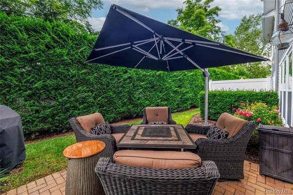 a patio view with a seating space