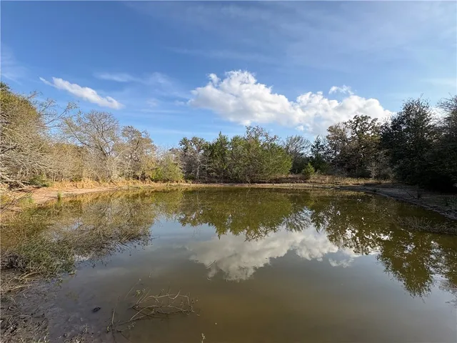 a view of lake with mountain