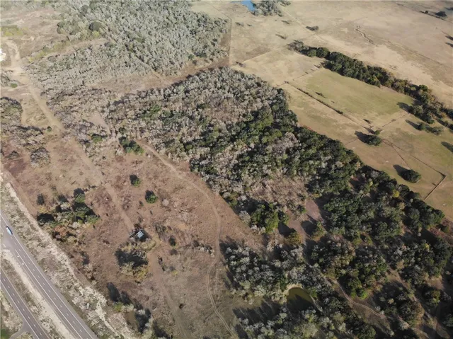 a view of a road with a yard