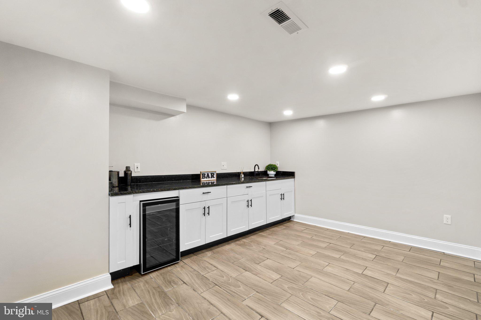 3815 Ridgecroft Road Baltimore, MD 21206 - Photo 22 of 29 Bar area in basement