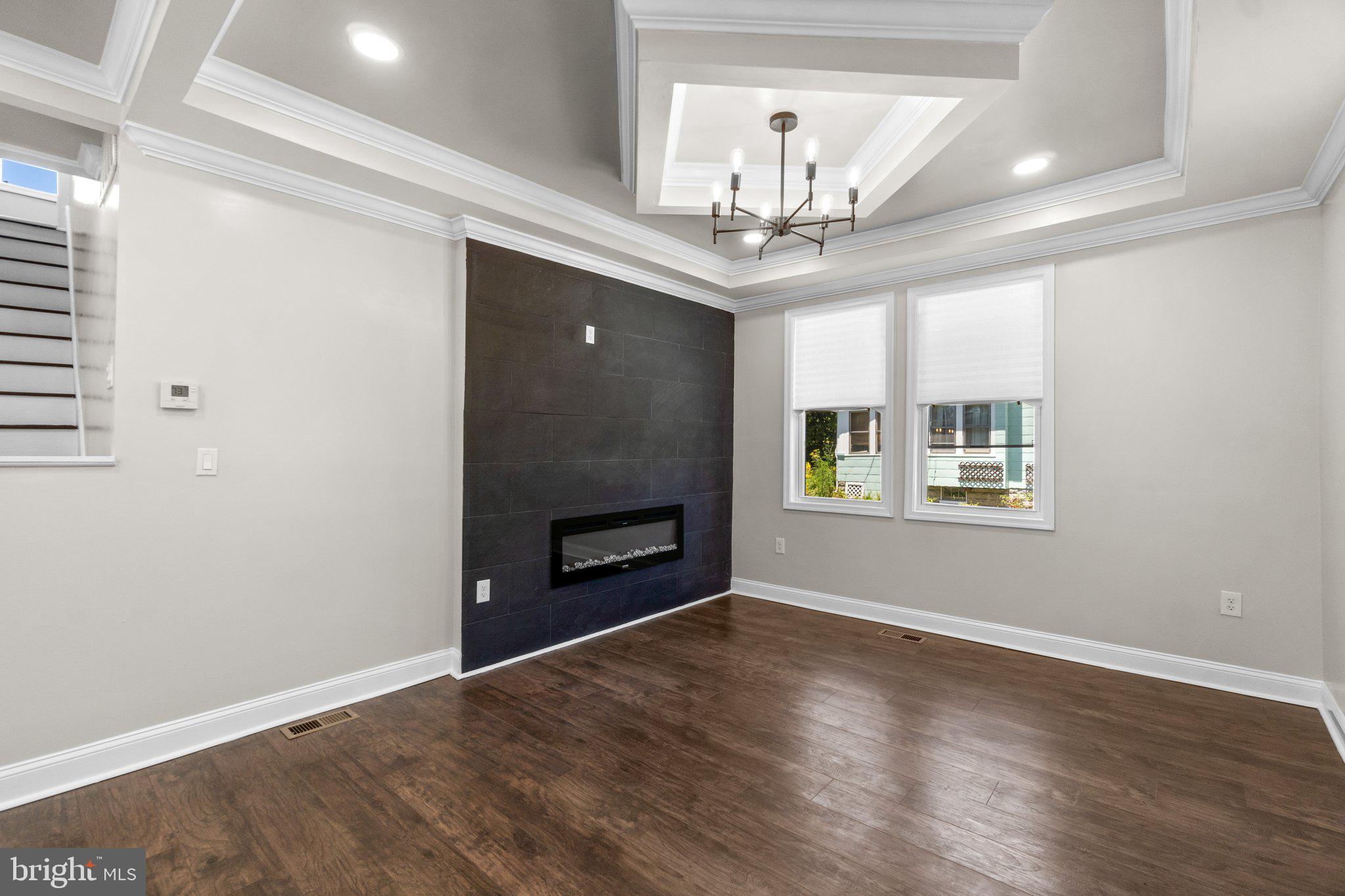3815 Ridgecroft Road Baltimore, MD 21206 - Photo 3 of 29 Living room with electric fireplace