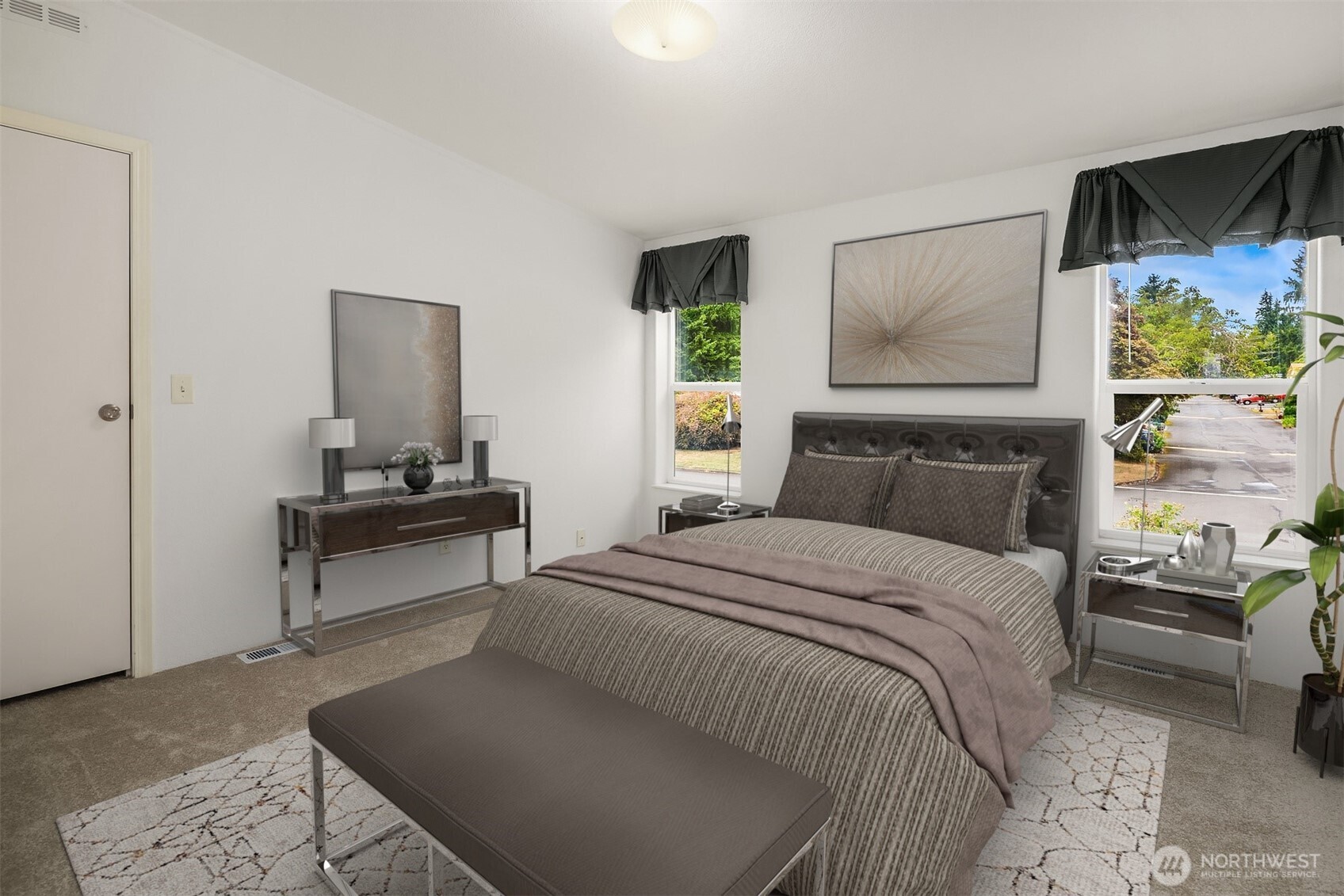 3222 206th Place Southeast Bothell, WA 98012 - Photo 13 of 32 a bedroom with a bed and a flat screen tv