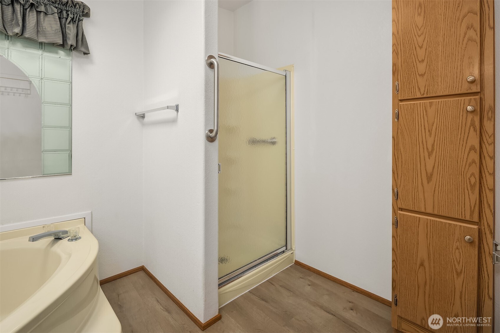 3222 206th Place Southeast Bothell, WA 98012 - Photo 16 of 32 a bathroom with a tub and sink