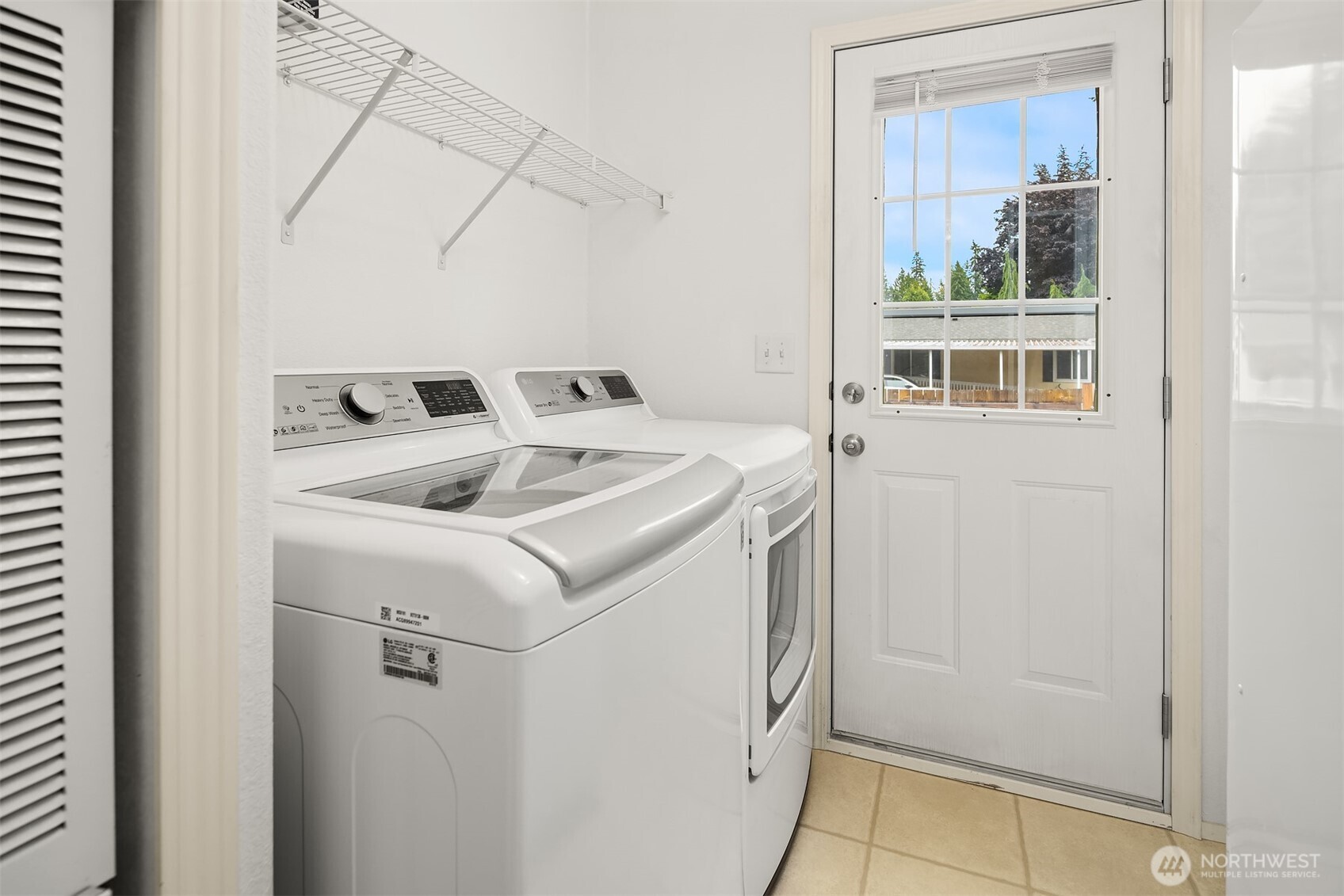 3222 206th Place Southeast Bothell, WA 98012 - Photo 22 of 32 a utility room with dryer and washer