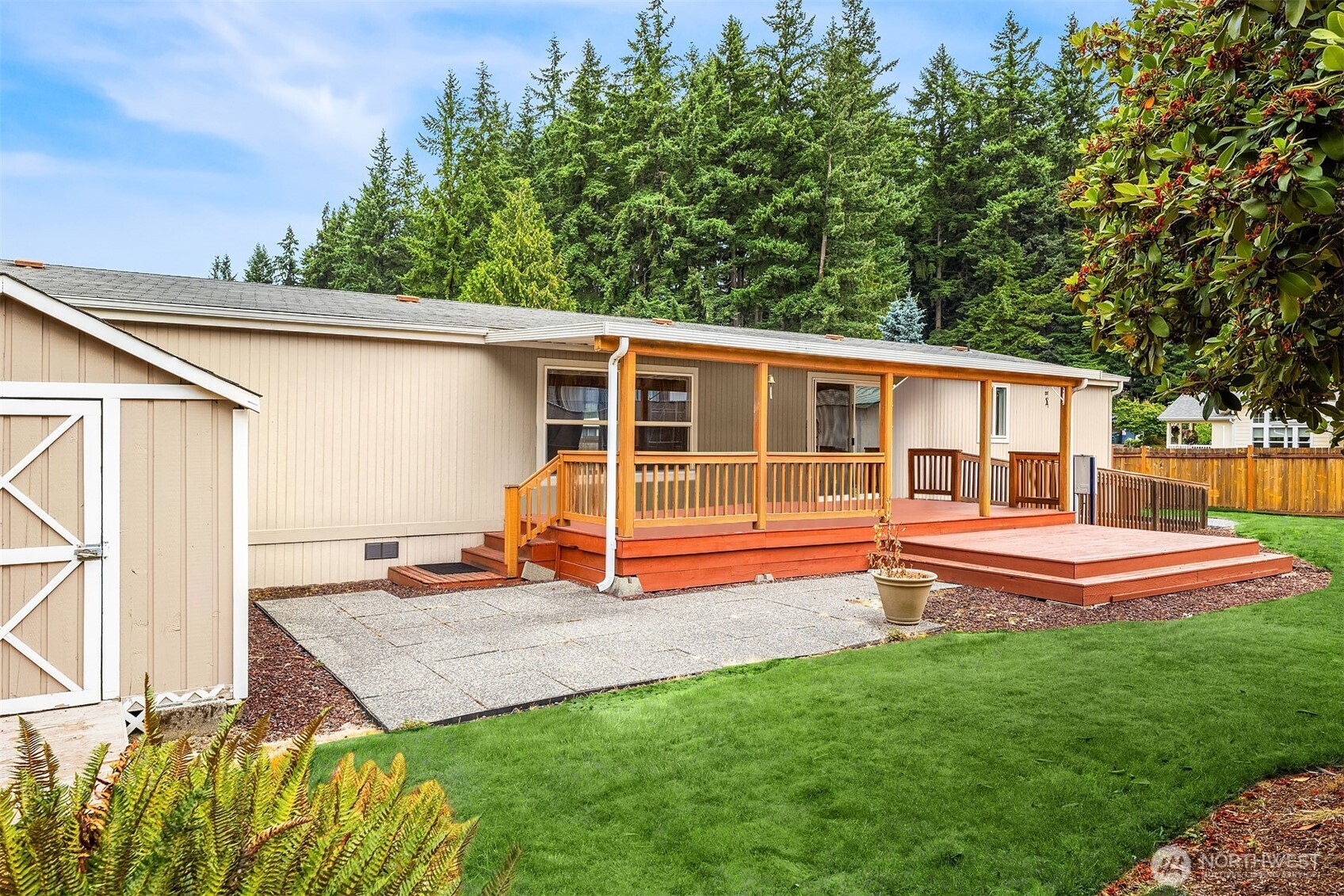 3222 206th Place Southeast Bothell, WA 98012 - Photo 24 of 32 a view of a house with backyard and sitting area