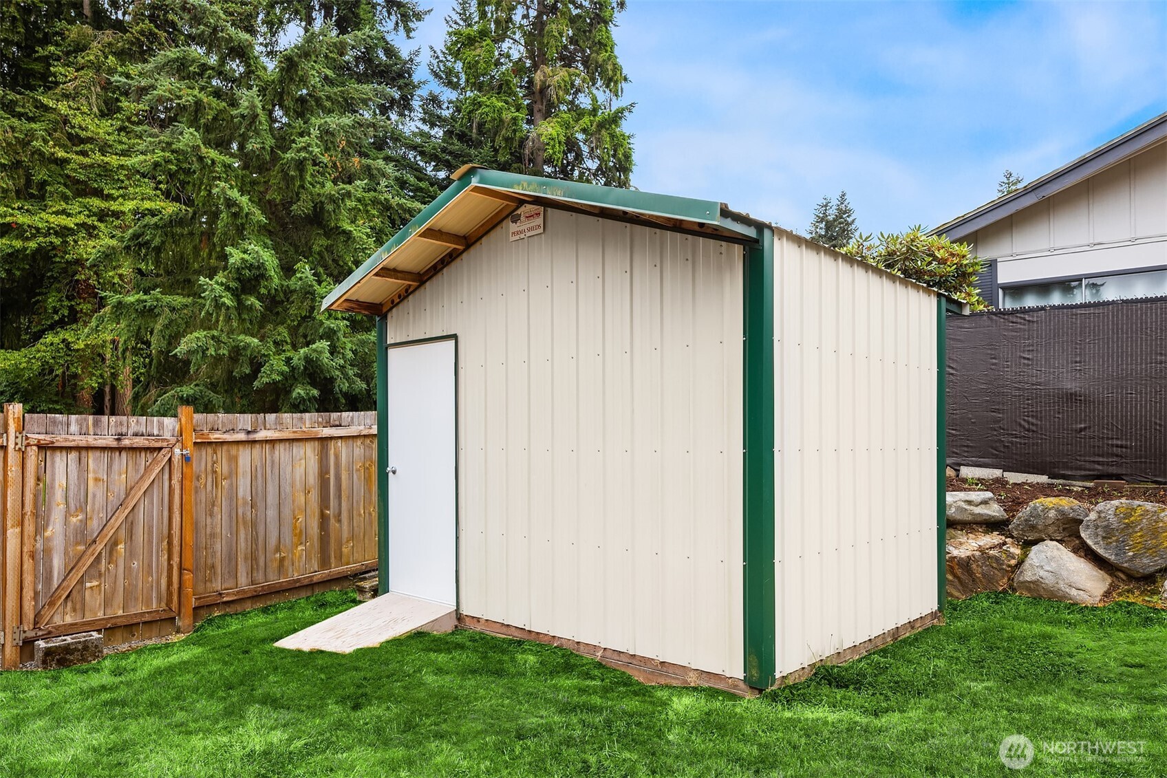 3222 206th Place Southeast Bothell, WA 98012 - Photo 28 of 32 a backyard of a house with lots of green space