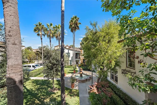 a view of a city with flower plants