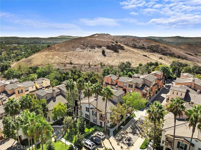 a view of a city with mountains in the background